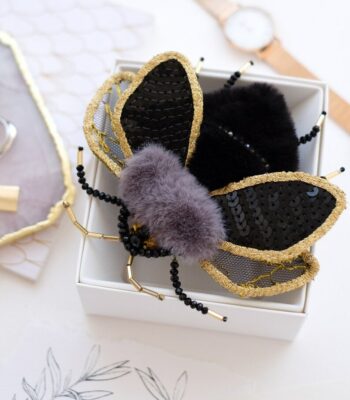 fluffy brooch